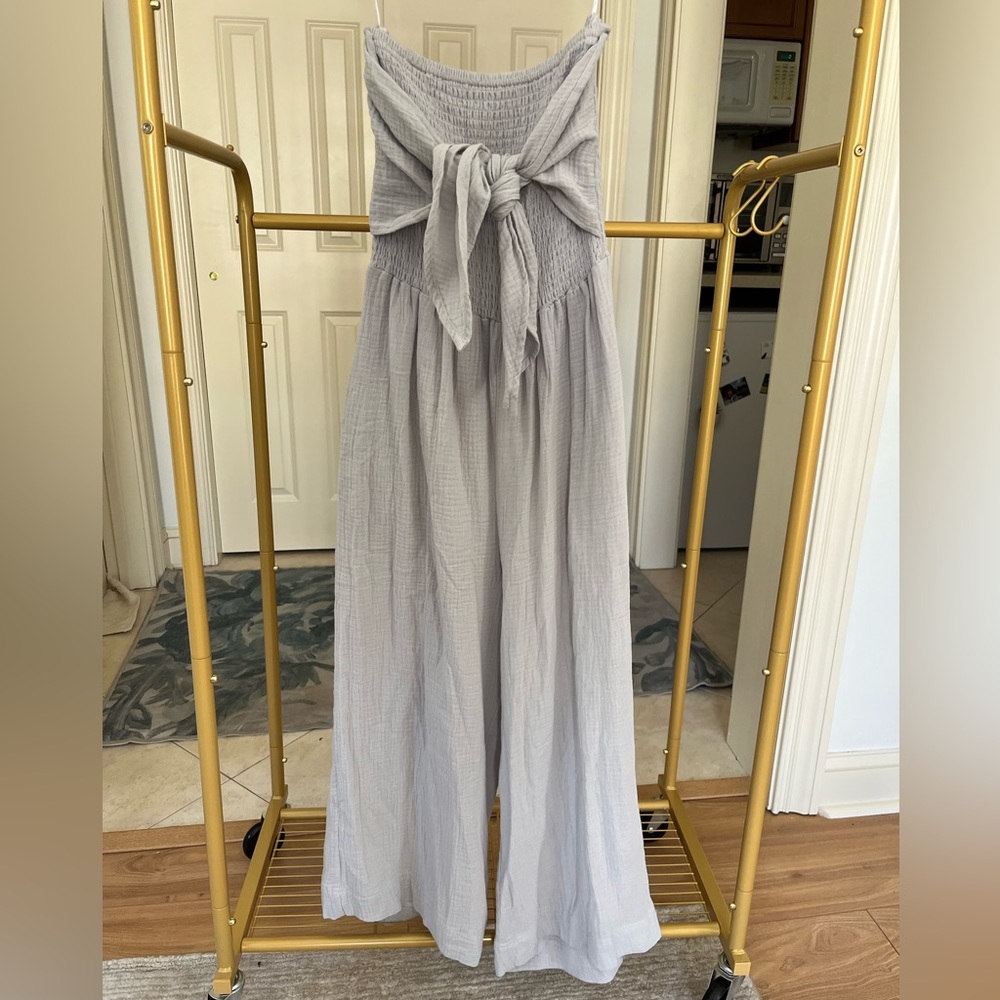 Like new-  Charlie Paige strapless jumpsuit. Light grey with tie front.